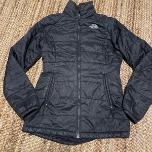 North face coat. Minor tear on the sleeve